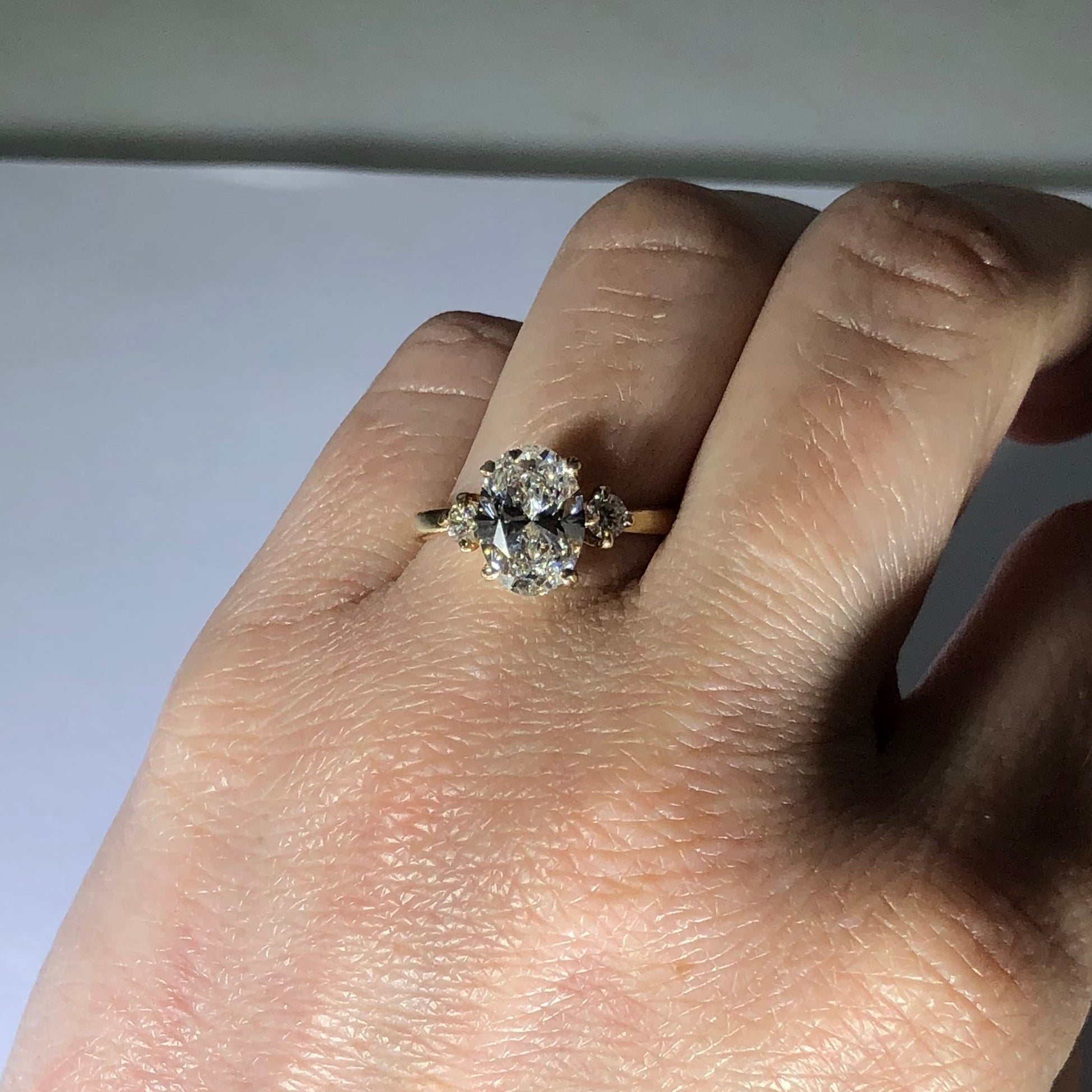 Classic Trio Engagement Ring w. Oval Diamond