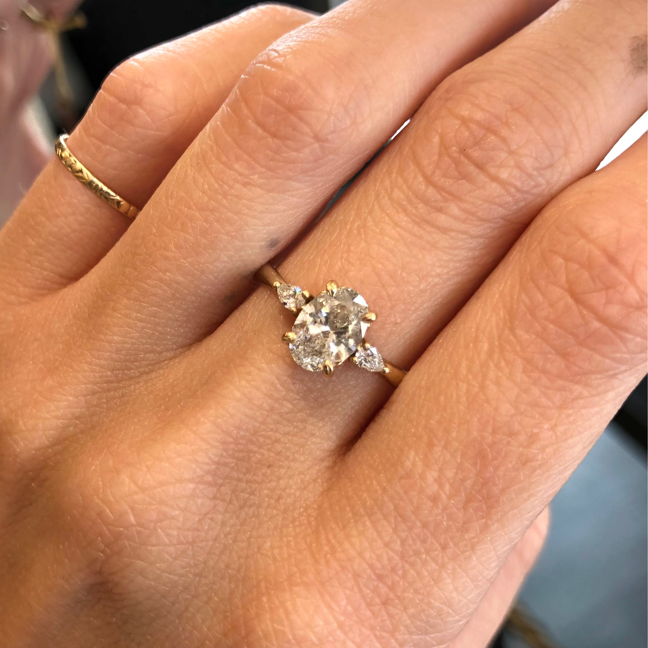 Oval With Petals Engagement Ring