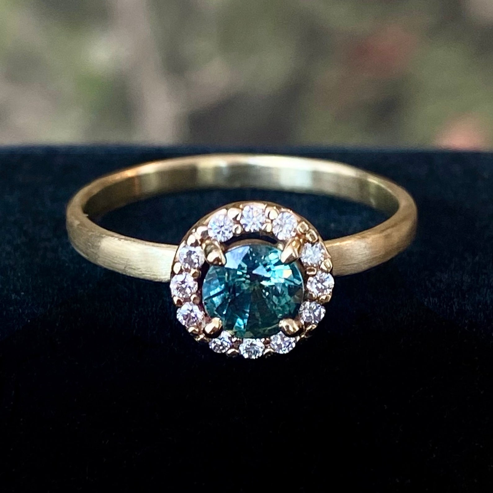 The Halo Engagement Ring w. Teal Sapphire