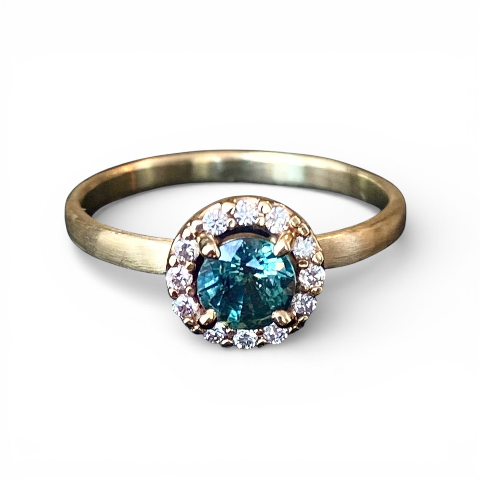 The Halo Engagement Ring w. Teal Sapphire