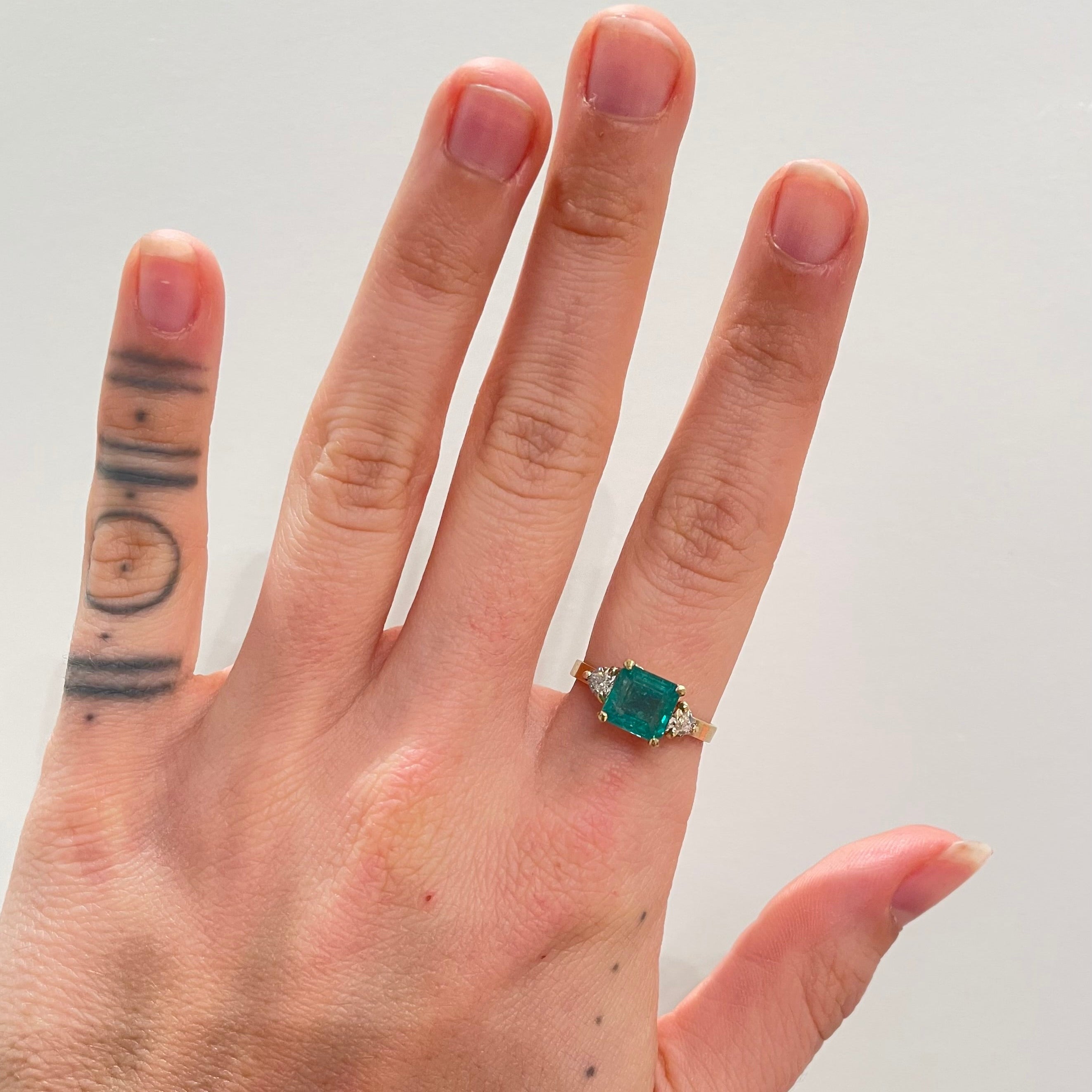 jewelry, fine jewelry, emerald, diamond, trillion, diamond trillion, ring, engagement ring, gold, 14K gold, yellow gold, emerald cut