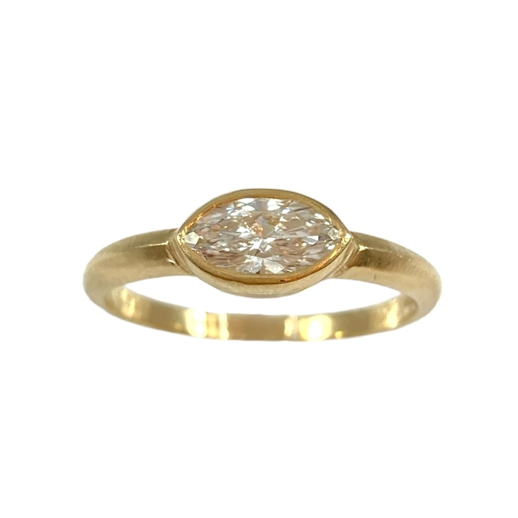 The Bezel Solitaire Engagement Ring w. Marquise Diamond