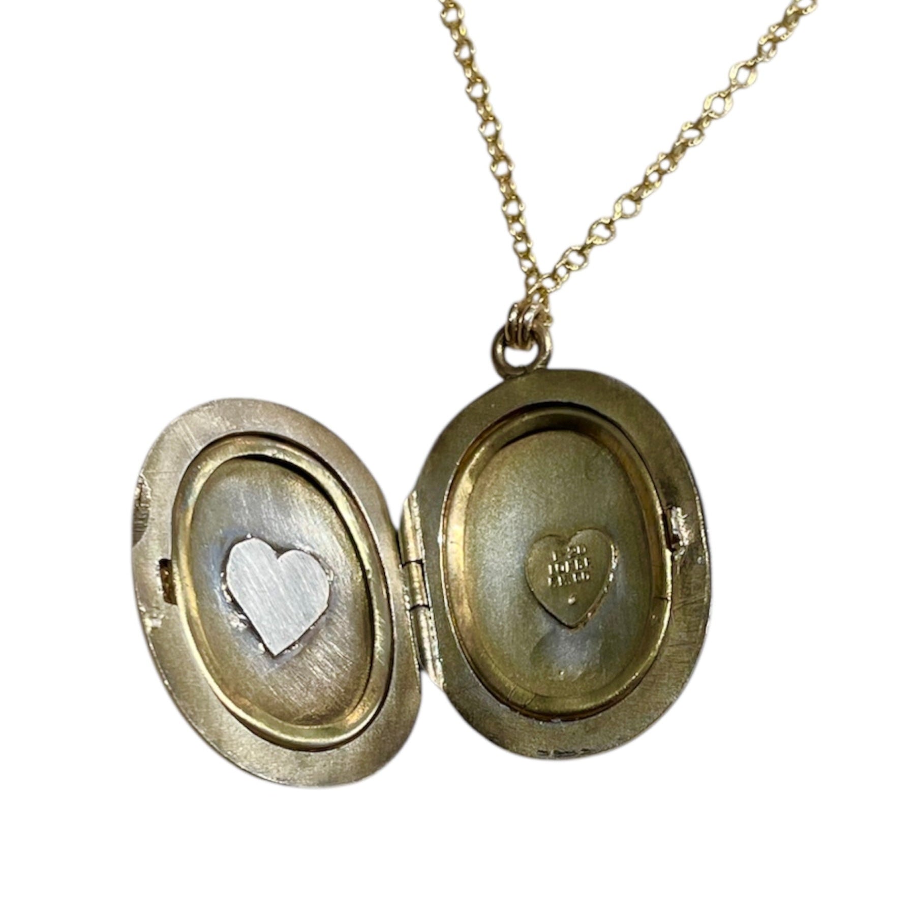 Oval locket, antique oval locket, antique necklace, antique gold locket, antique jewelry, antique sapphire necklace, sapphire necklace, rose cut sapphire, rose cut necklace, rose cut gemstone, local jeweler, jewelry near me, women-owned, local business, small business, white topaz