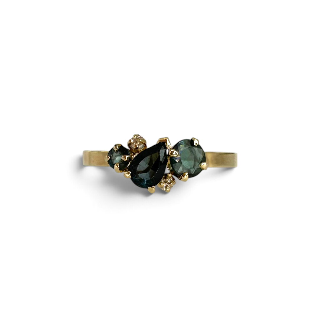 The Asymmetrical Sapphire Cluster Ring