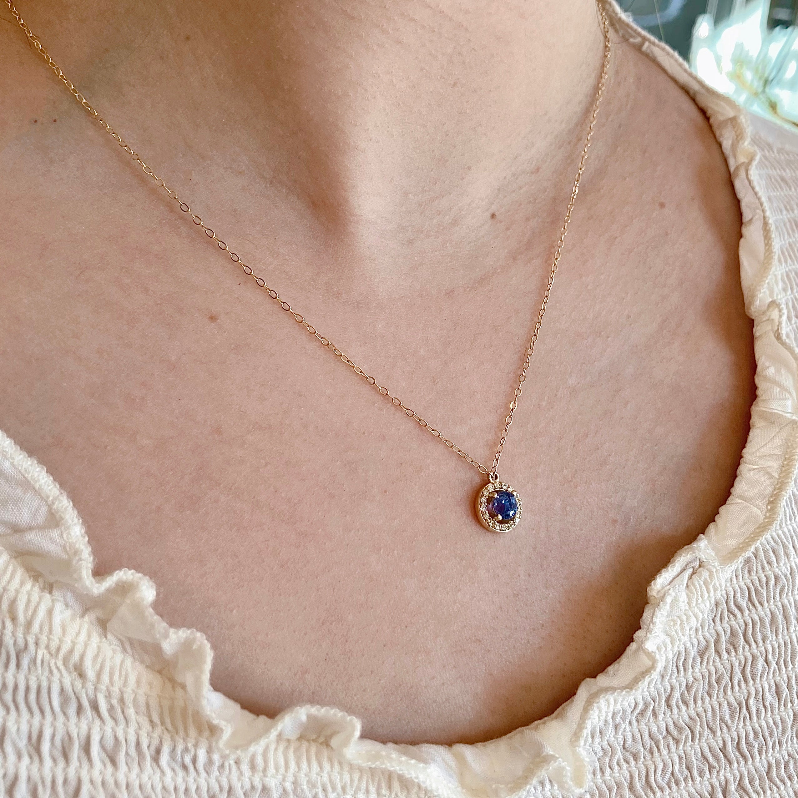 necklace, jewelry, diamond, diamond necklace, halo, halo necklace, sapphire, blue sapphire, sapphire necklace, halo sapphire necklace, sapphire and diamond necklace, sapphire and diamond halo, yellow gold, white gold, 14k gold, gold chain, rebekah brooks, rebekah brooks jewelry, northampton, cambridge