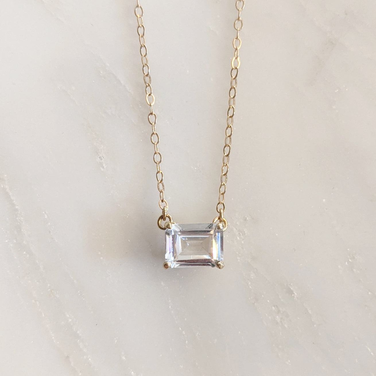 14k East West Emerald Cut White Sapphire Necklace