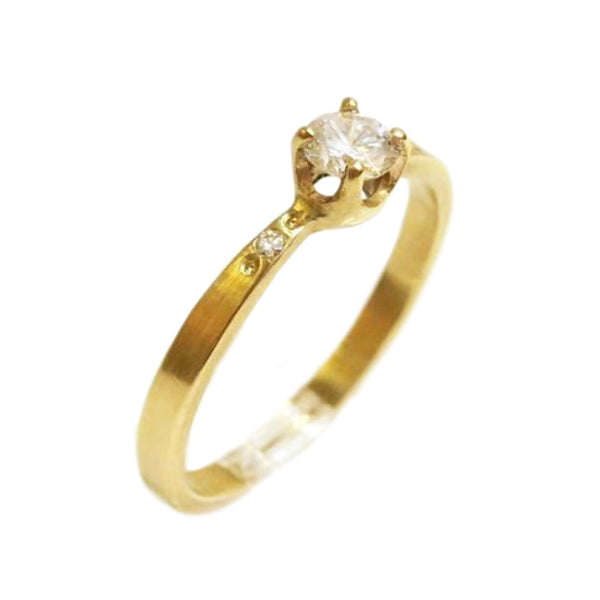 The Petite Solitaire Engagement Ring w. Diamond Accents