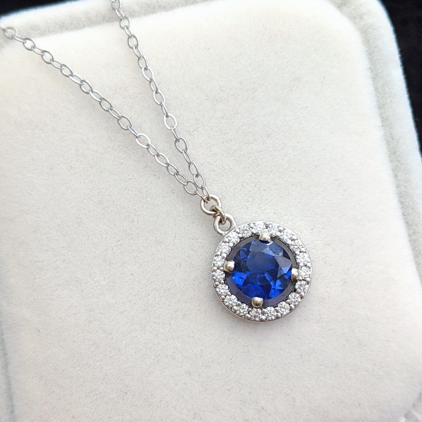 necklace, jewelry, diamond, diamond necklace, halo, halo necklace, sapphire, blue sapphire, sapphire necklace, halo sapphire necklace, sapphire and diamond necklace, sapphire and diamond halo, yellow gold, white gold, 14k gold, gold chain, rebekah brooks, rebekah brooks jewelry, northampton, cambridge