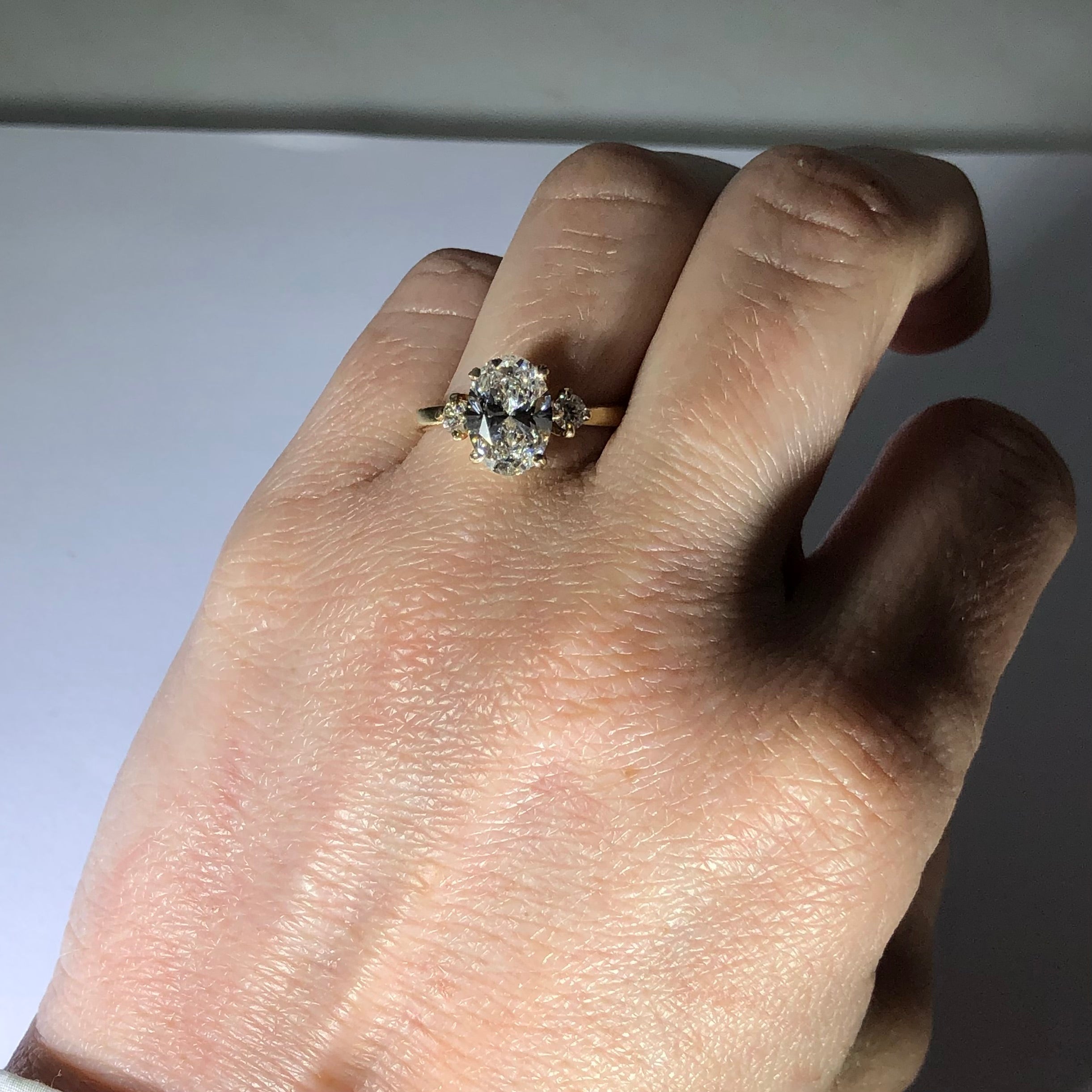 Classic Trio Engagement Ring w. Oval Diamond