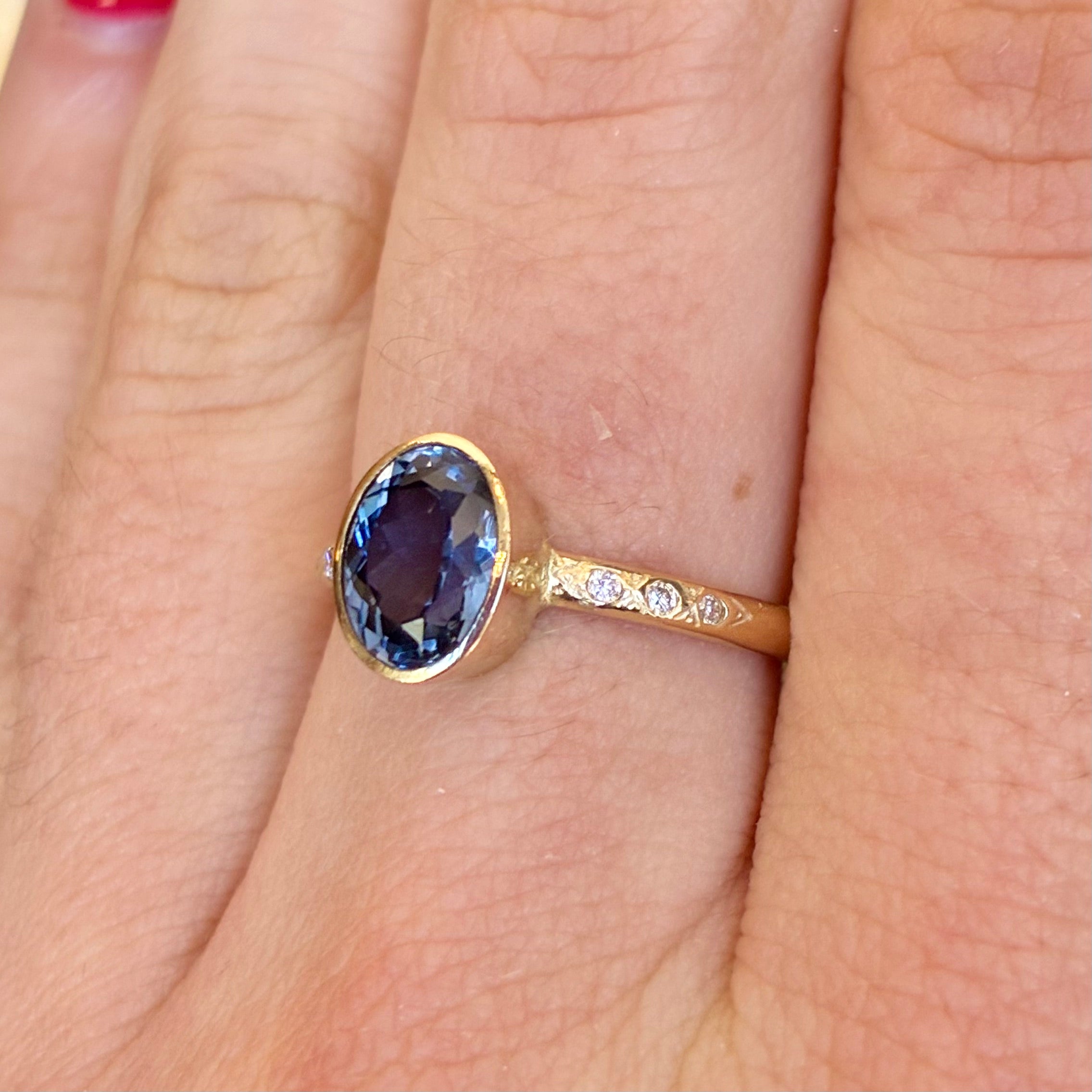 Blue Sapphire Bezel Celestial Ring