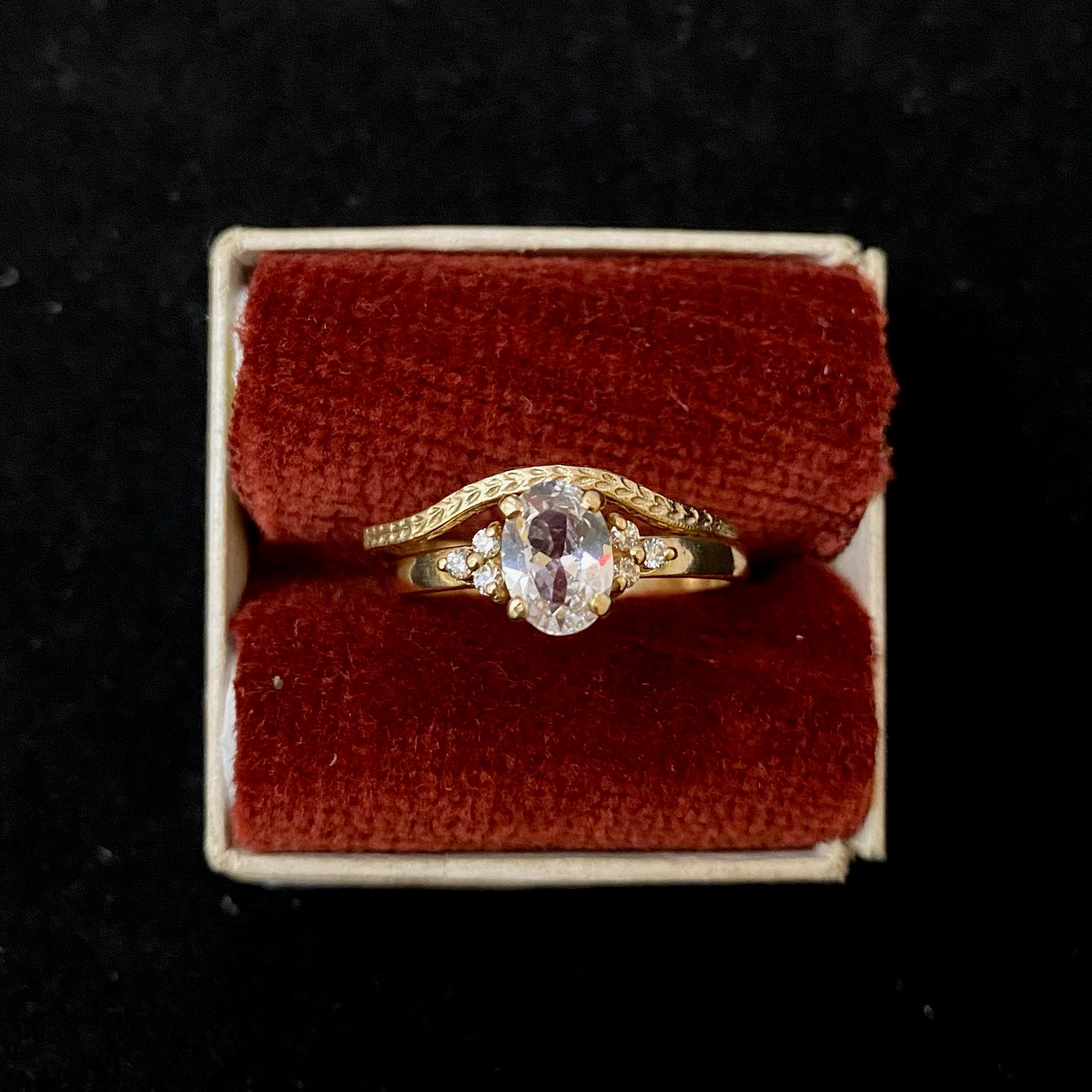 14k yellow gold wheat eternity engraving band with 14k yellow gold oval center stone with cluster of round diamond accents
Handmade jewelry, antique and vintage, antique inspired jewelry, vintage inspired jewelry, handcrafted jewelry, custom design jewelry 