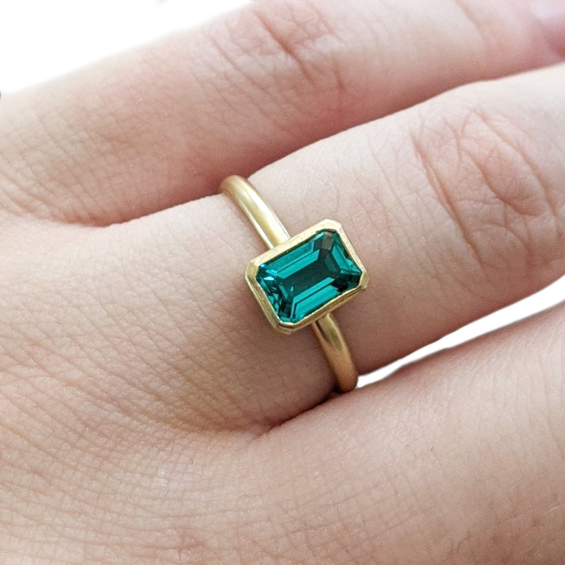 14k gold bezel, handmade bezel, handmade ring, emerald gemstone, emerald cut emerald, natural emerald, emerald gemstone ring, emerald bezel ring, clean girl aesthetic, timeless jewelry, bezel ring, modern design, vintage inspired, handmade 14k gold ring, custom design jewelry