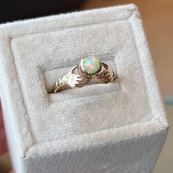 Antique Hands and Opal Ring