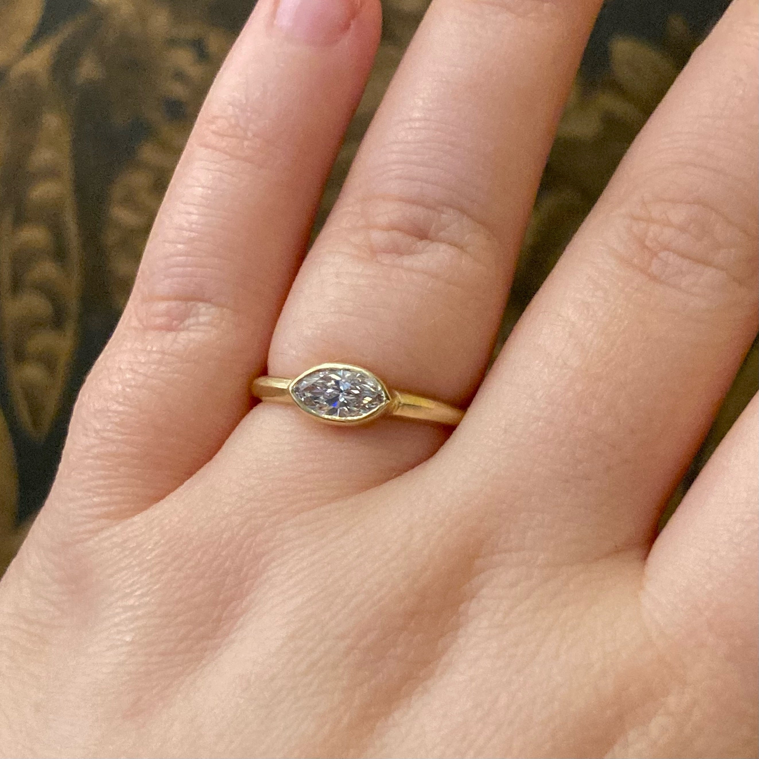 The Bezel Solitaire Engagement Ring w. Marquise Diamond