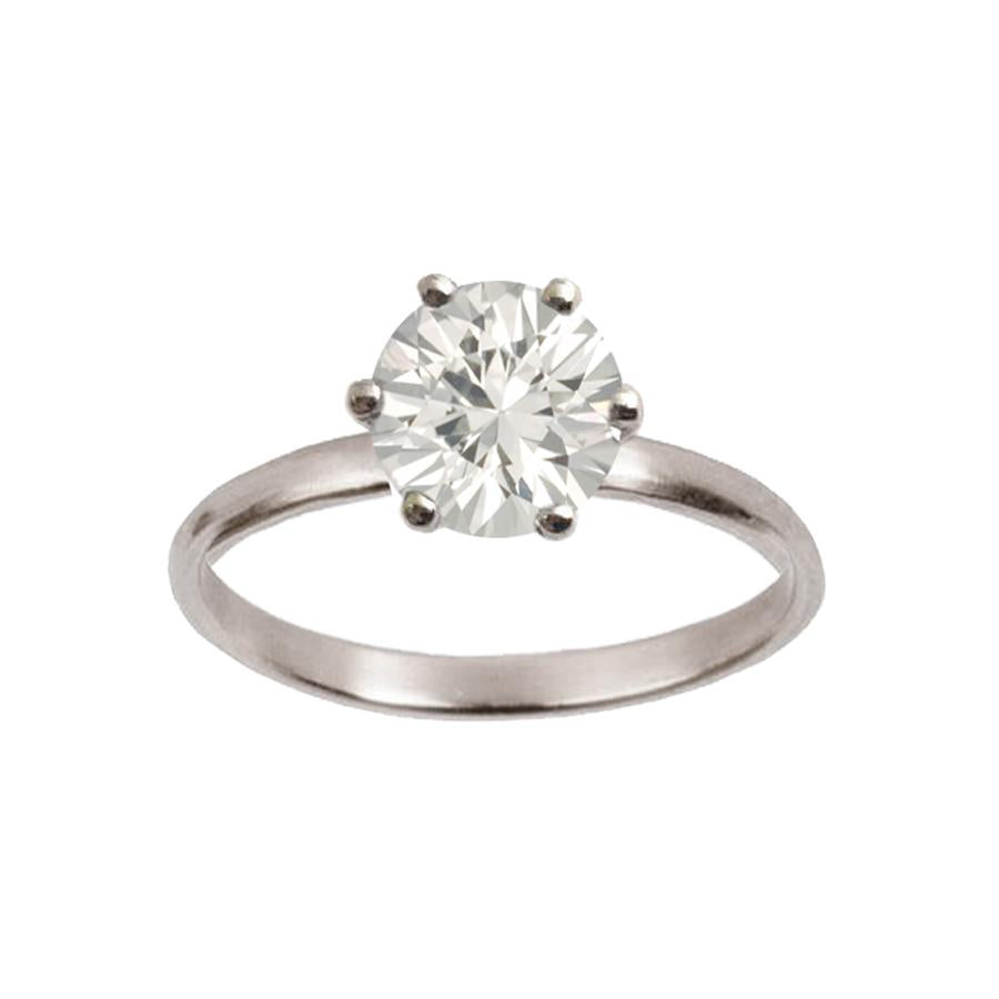 The Classic Solitaire Engagement Ring w. White Sapphire